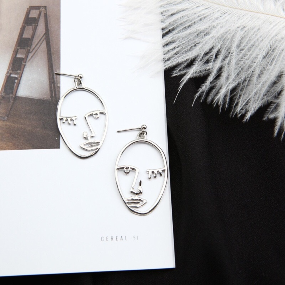 Hollow Face Silver Color earrings